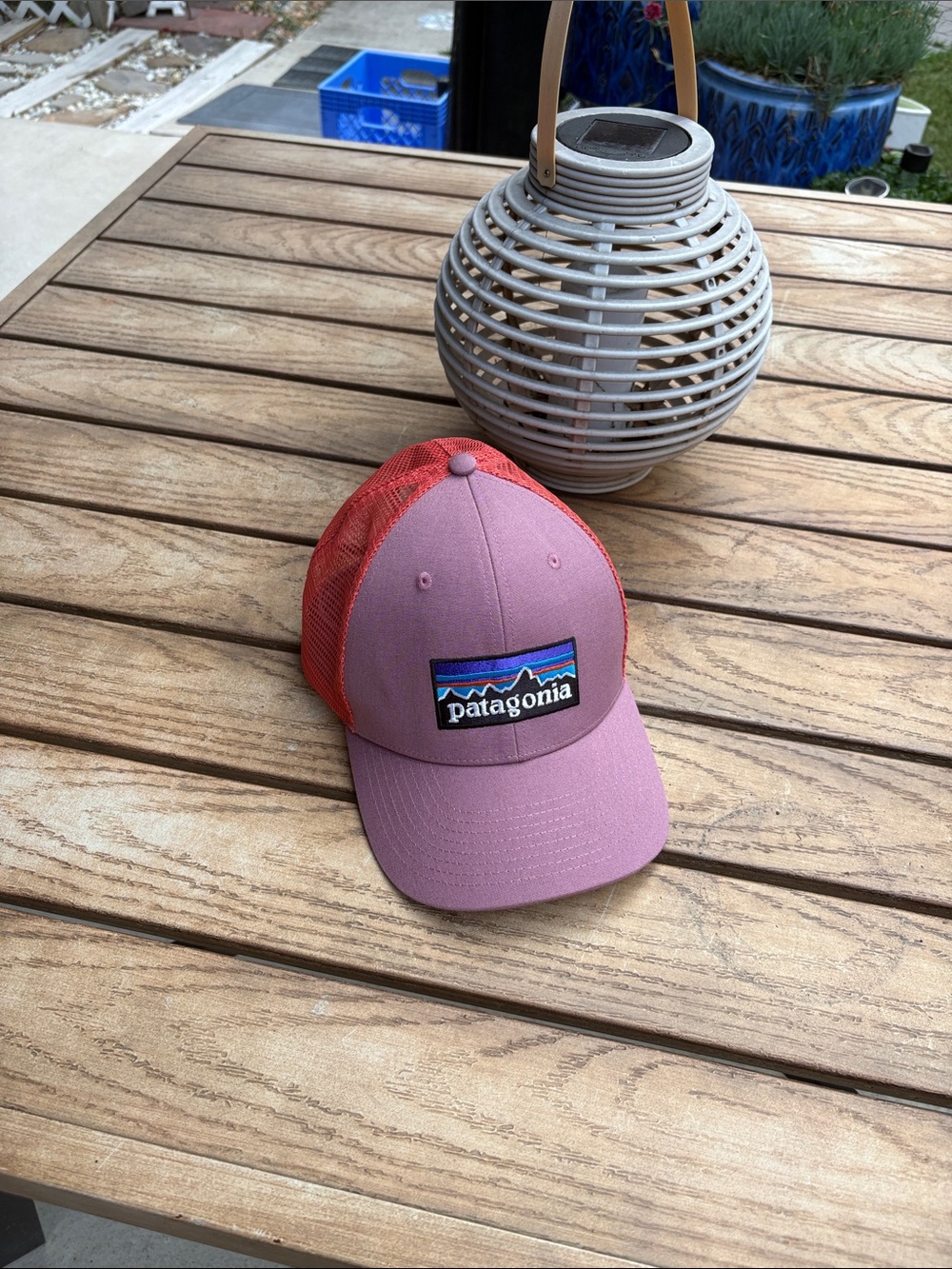 Patagonia Rose Pink Front with orange Mesh Logo Trucker Hat. Could be universal